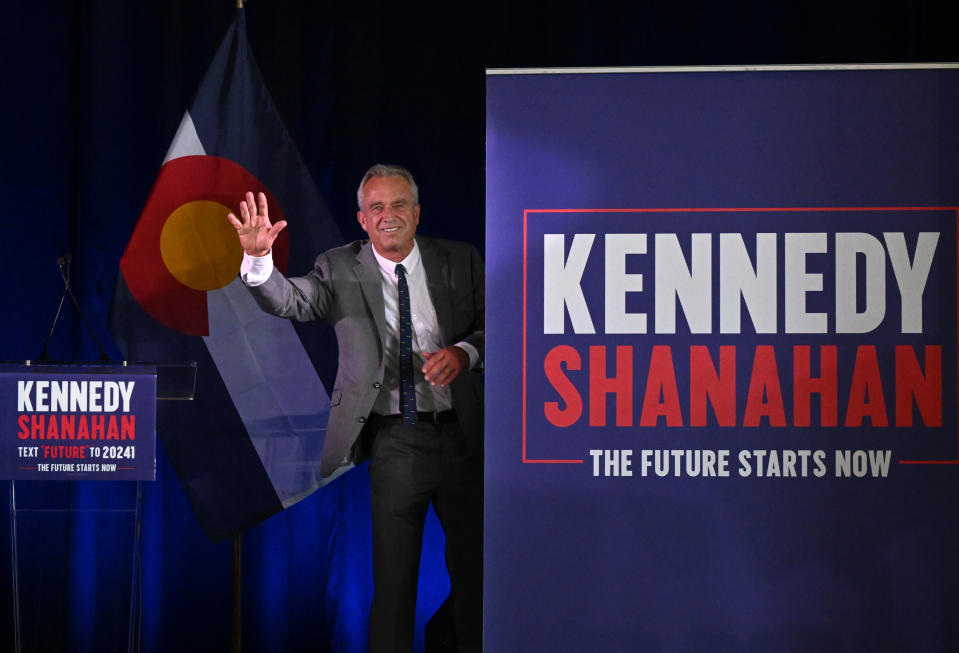 AURORA, CO - MAY 19: Independent presidential candidate Robert F. Kennedy Jr. waves to the crowd as he exits the stage after speaking during a campaign rally at the Stanley Marketplace Hangar in Aurora, Colorado on May 19, 2024. Kennedy spoke of his plans 